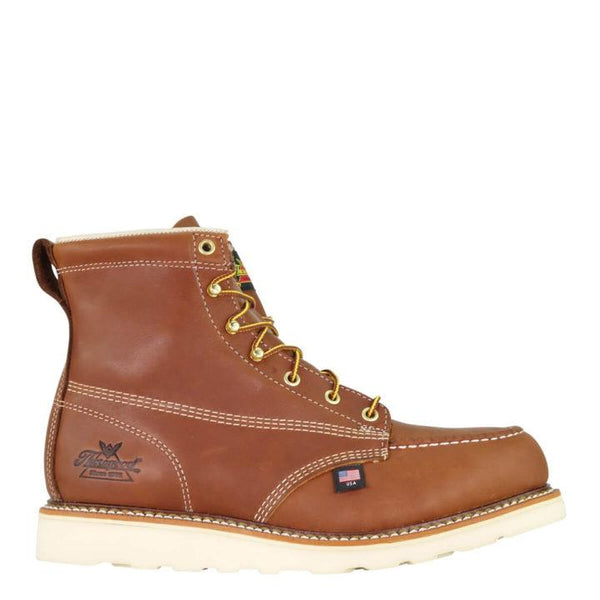side of tan moccasin style boot with yellow and brown laces and white sole