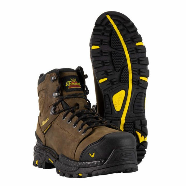 two brown boots with black toe guard, black sole and laces, and yellow logo on side