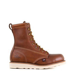 mens brown logger boot with white interior, sticthing, and sole. Black thorogood logo stamped on heel with gold/brown laces. right side view