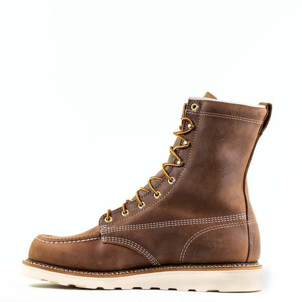 left side view of mens brown logger boot with white sole and stitching and yellow/brown laces