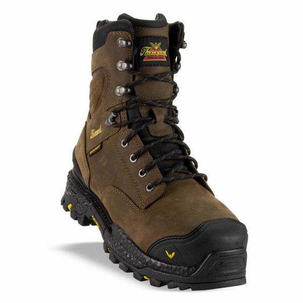 Front view of men's brown leather composite work boot. Black rubber toe, soles, and ankle cuff. Yellow Thorogood logo on tongue and outside ankle.