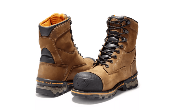 mens brown logger boot with orange line along tan soles. Black toe and tongue pair