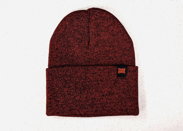 red cuffed beanie with tough duck tag sewn on hem