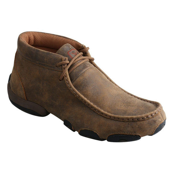 Solid Rugged brown moc shoe with black circular pattern soles