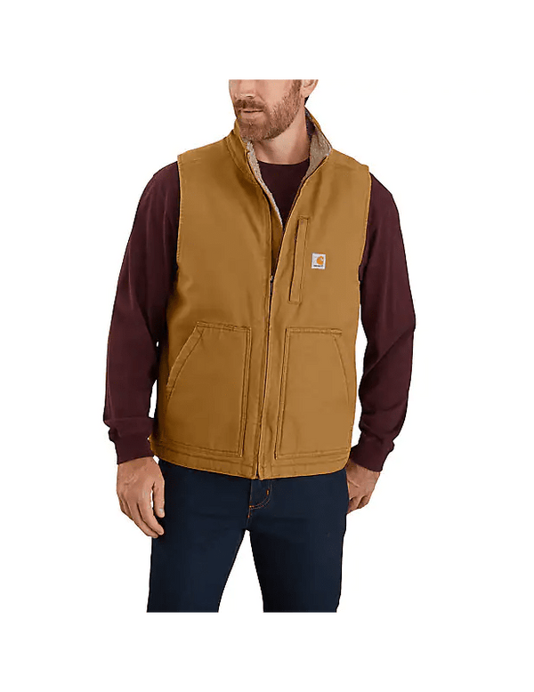 man wearing tan Carhartt vest over red long sleeve shirt