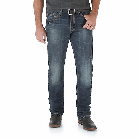 Man in Dark grey shirt & belt with blue jeans
