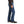 Load image into Gallery viewer, man in brown solid button up and brown belt wearing blue jeans side view
