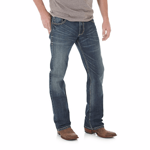 Man in sandy tshirt wearing bootcut jeans