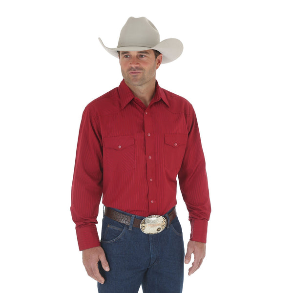 man in off white cowboy hat and red stripped pattern button up